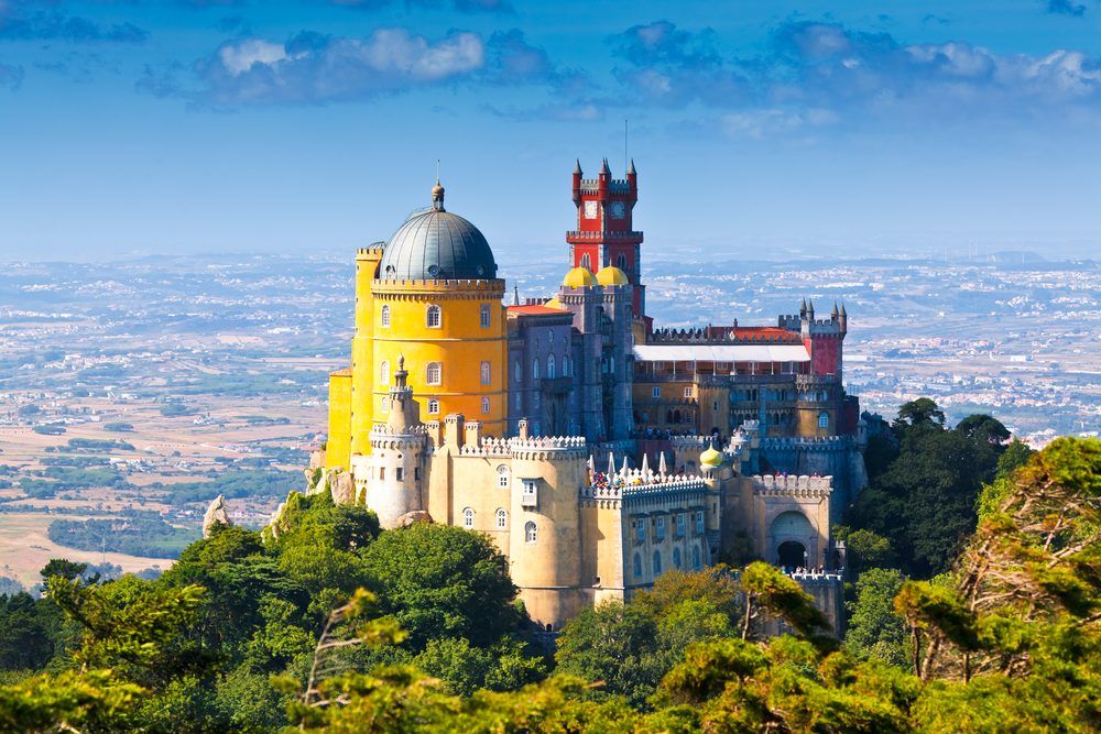 The colourful domes and towers of Pena Palace above Sintra