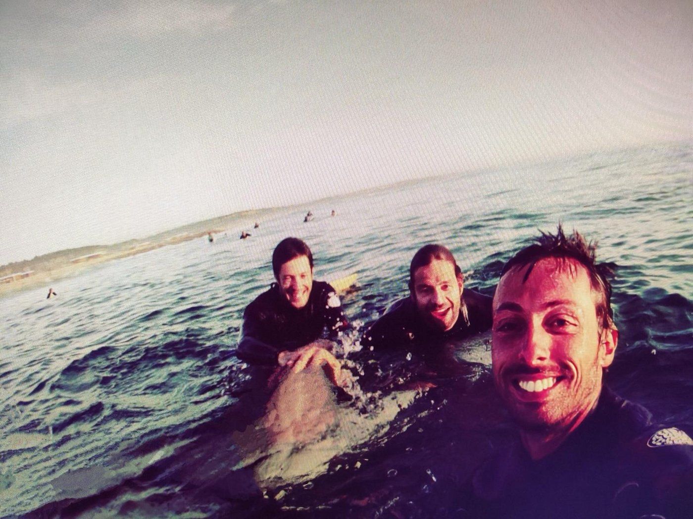 The My Lisbon Holidays team in the water off the coast near Lisbon